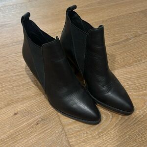Solsana black leather booties.